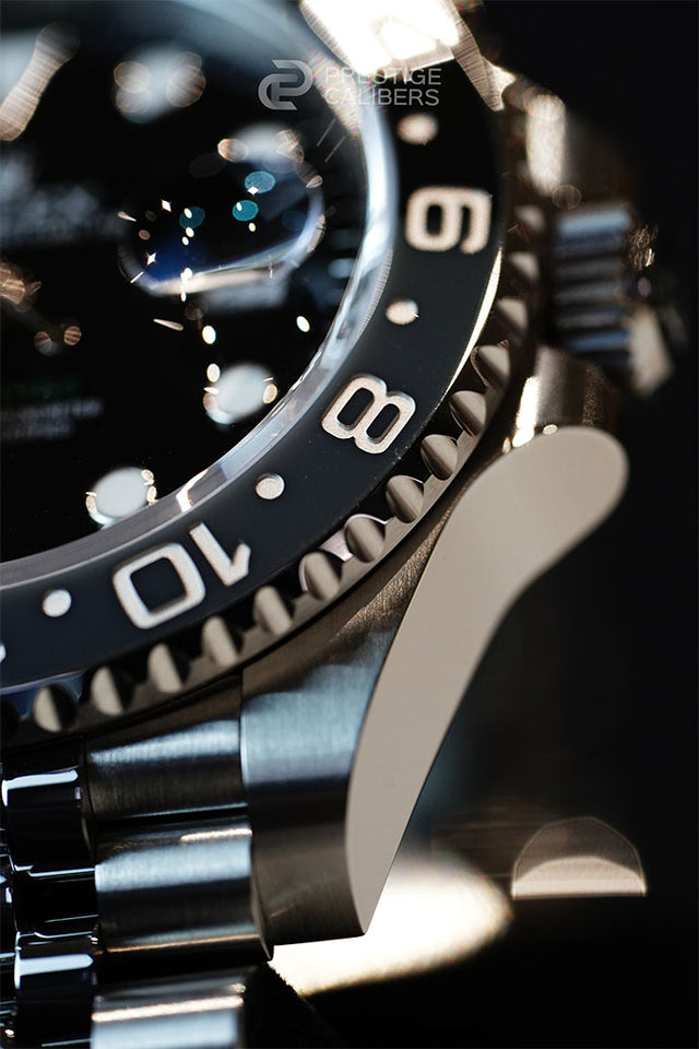 Close-up of a bezel of a luxury Rolex Bruce Wayne watch
