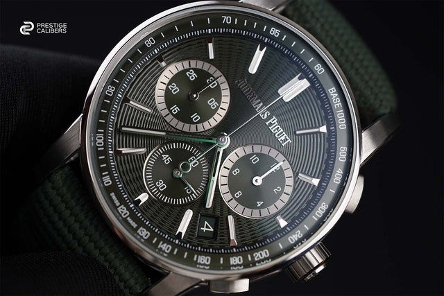 Luxury watch with detailed face and brand logo on a dark background