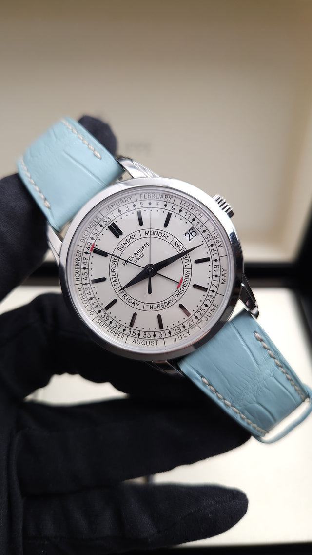 Patek Philippe Calatrava Weekly Calendar 5212A-001 40 mm stainless-steel men’s watch with silver dial on blue alligator strap with folding clasp
