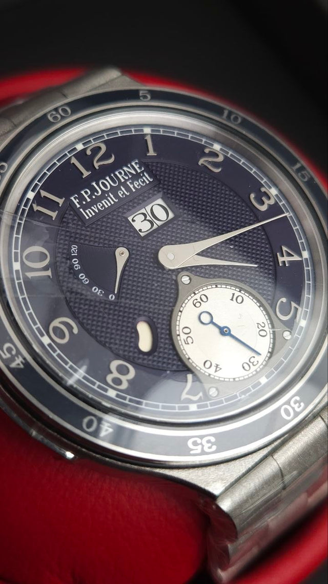 F.P. Journe LineSport Automatique Réserve ARS2 44 mm platinum men’s watch with hammered case and bracelet and blue-mauve guilloché dial
