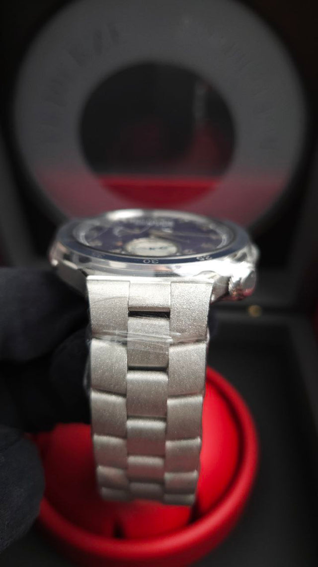 F.P. Journe LineSport Automatique Réserve ARS2 44 mm platinum men’s watch with hammered case and bracelet and blue-mauve guilloché dial
