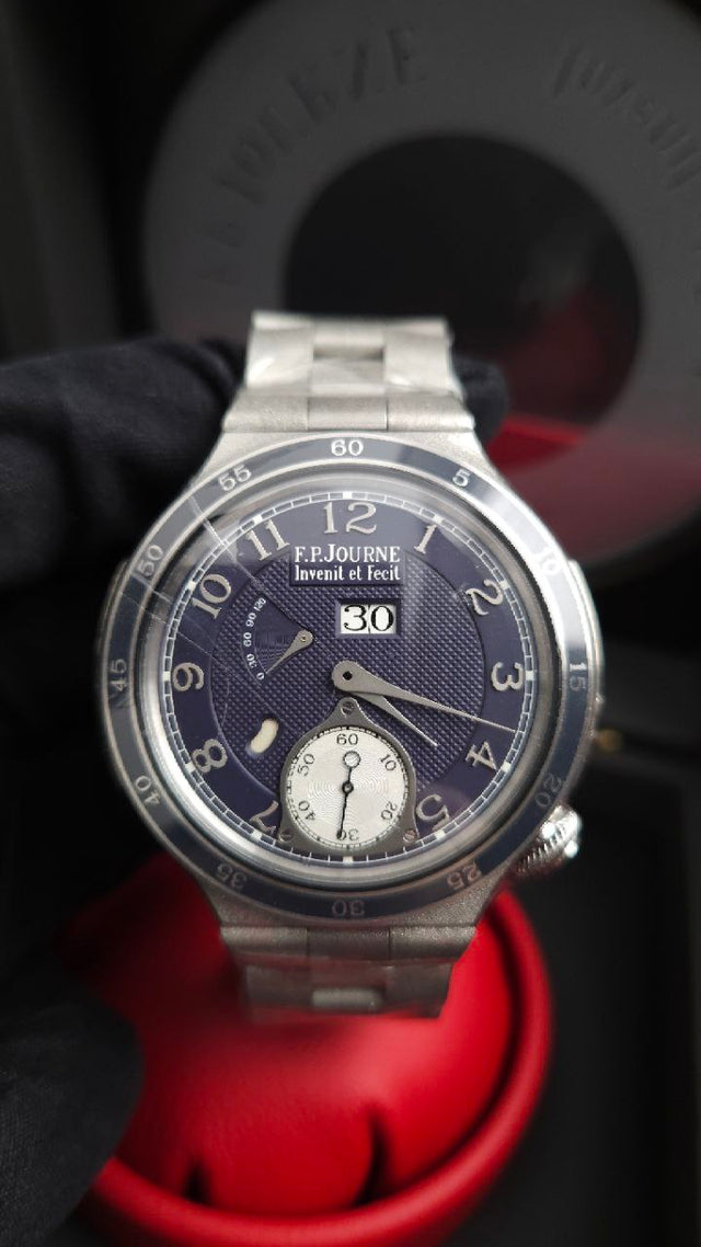 F.P. Journe LineSport Automatique Réserve ARS2 44 mm platinum men’s watch with hammered case and bracelet and blue-mauve guilloché dial
