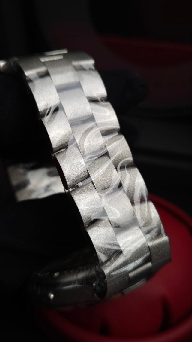 F.P. Journe LineSport Automatique Réserve ARS2 44 mm platinum men’s watch with hammered case and bracelet and blue-mauve guilloché dial
