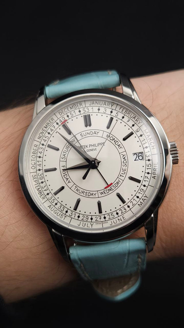 Patek Philippe Calatrava Weekly Calendar 5212A-001 40 mm stainless-steel men’s watch with silver dial on blue alligator strap with folding clasp
