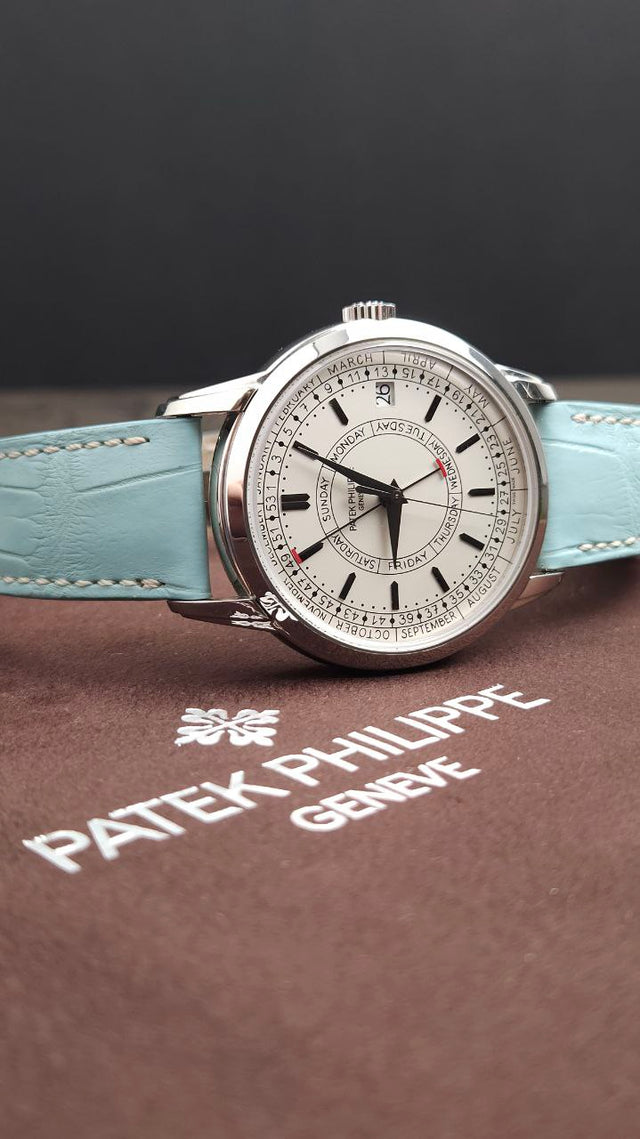 Patek Philippe Calatrava Weekly Calendar 5212A-001 40 mm stainless-steel men’s watch with silver dial on blue alligator strap with folding clasp
