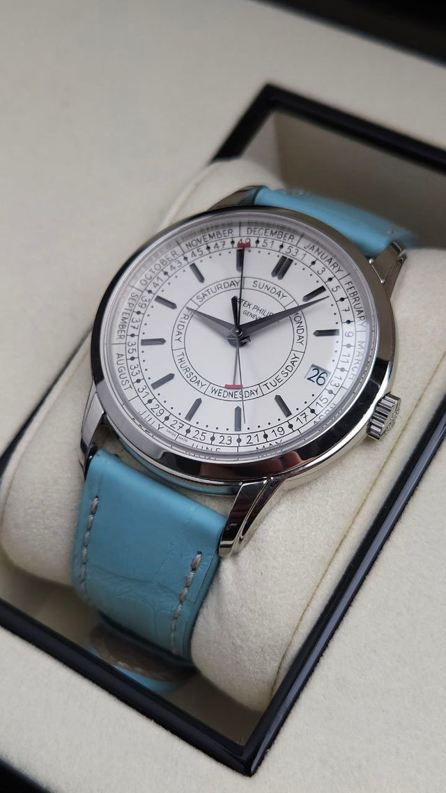 Patek Philippe Calatrava Weekly Calendar 5212A-001 40 mm stainless-steel men’s watch with silver dial on blue alligator strap with folding clasp
