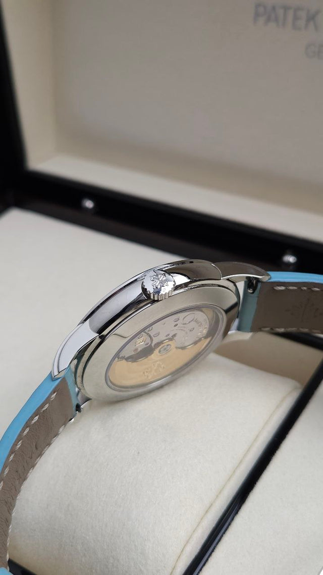 Patek Philippe Calatrava Weekly Calendar 5212A-001 40 mm stainless-steel men’s watch with silver dial on blue alligator strap with folding clasp
