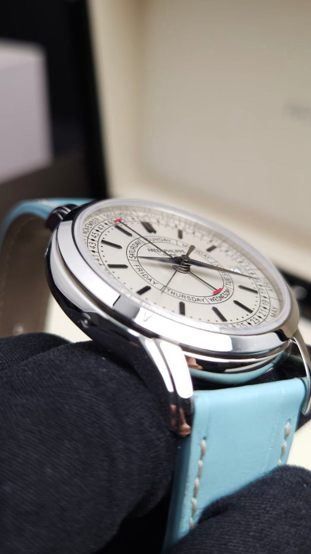 Patek Philippe Calatrava Weekly Calendar 5212A-001 40 mm stainless-steel men’s watch with silver dial on blue alligator strap with folding clasp
