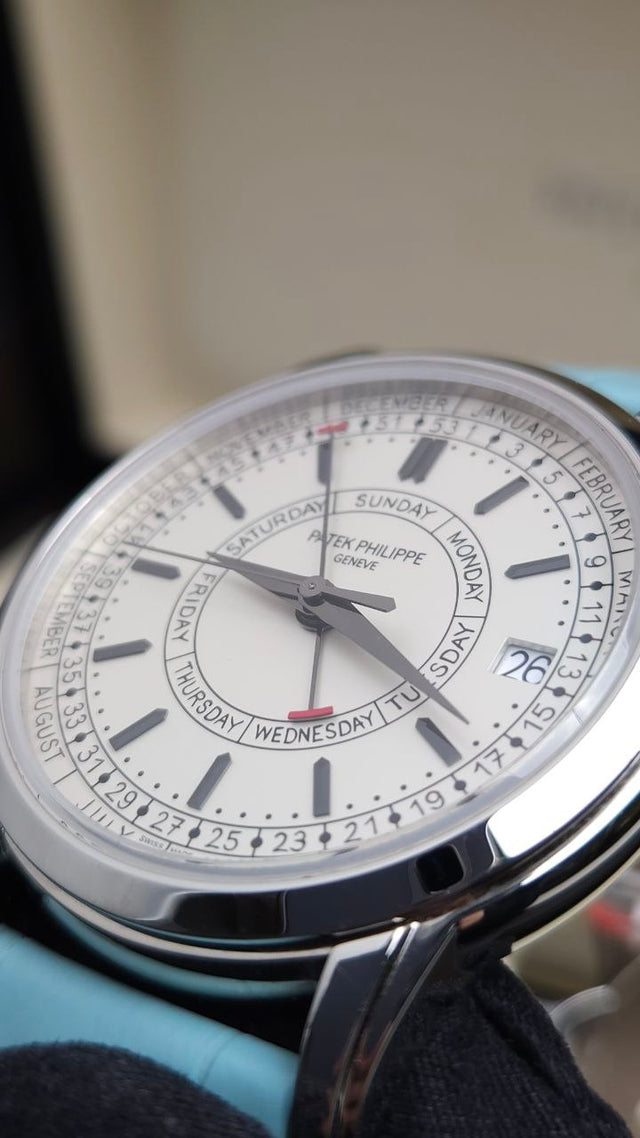 Patek Philippe Calatrava Weekly Calendar 5212A-001 40 mm stainless-steel men’s watch with silver dial on blue alligator strap with folding clasp
